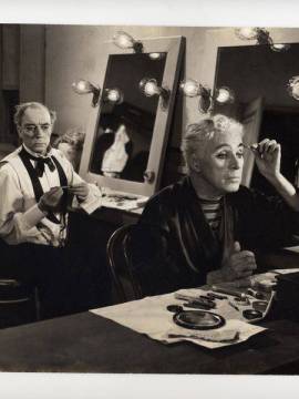 We all wear make-up and put on a fake mustache and hat.